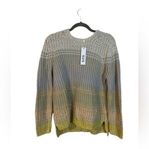 A gorgeous 525 sweater with tags attached in size medium